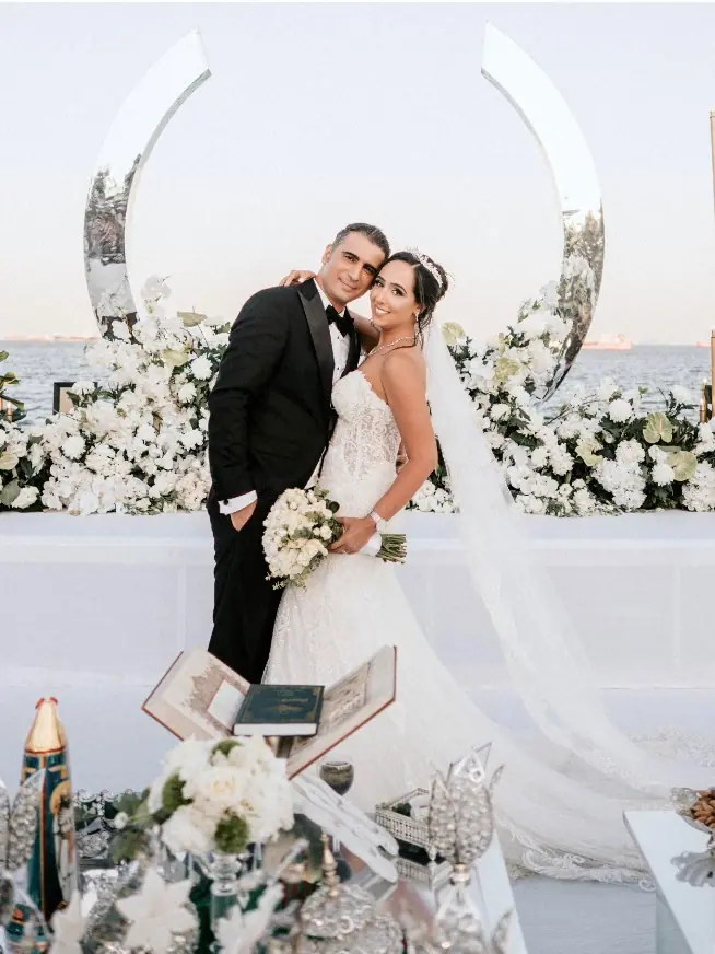 Bride and groom at a seaside Sofreh Aghd ceremony